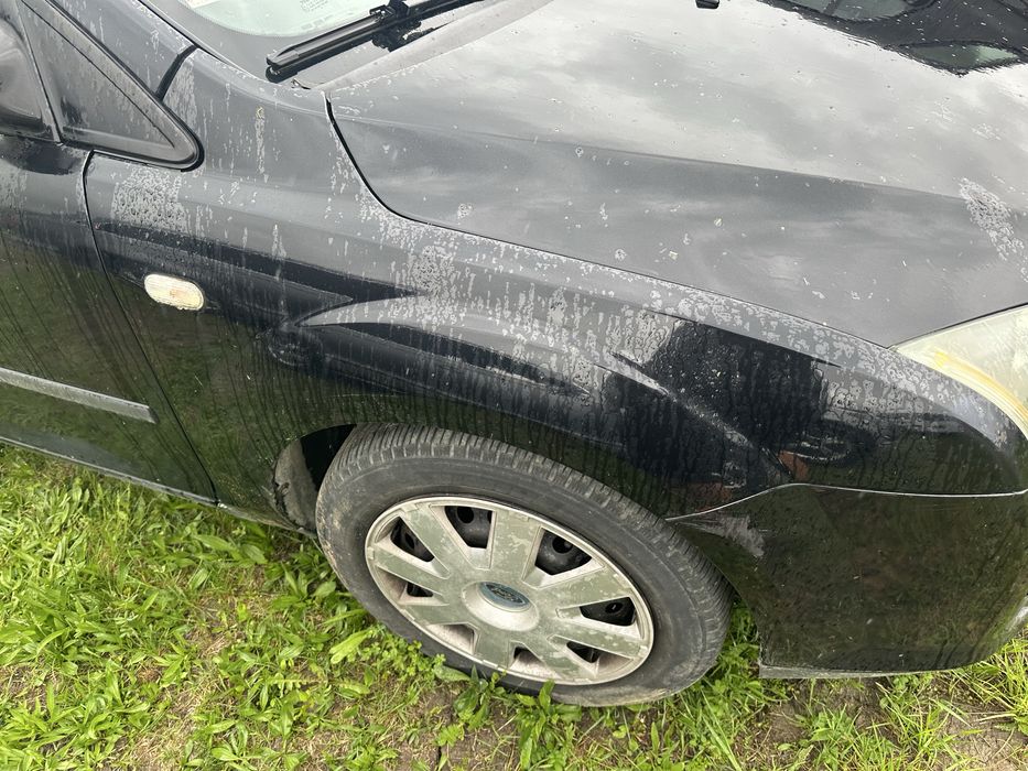 Capotă bară faruri aripi roți triple ford Focus 2