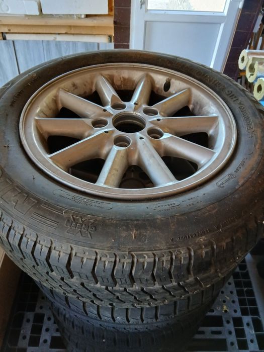 690 lei Set 5 jante aliaj BMW E36 ,rezerva originala ,anvelope in stare buna DOT 2017