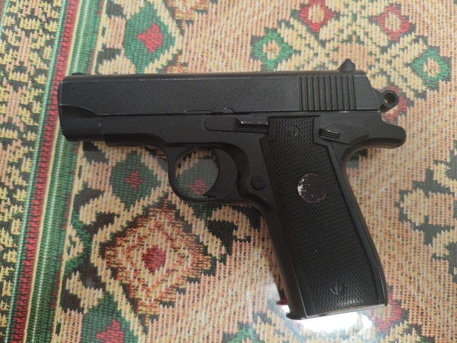 игрушечный пистолет , металлический