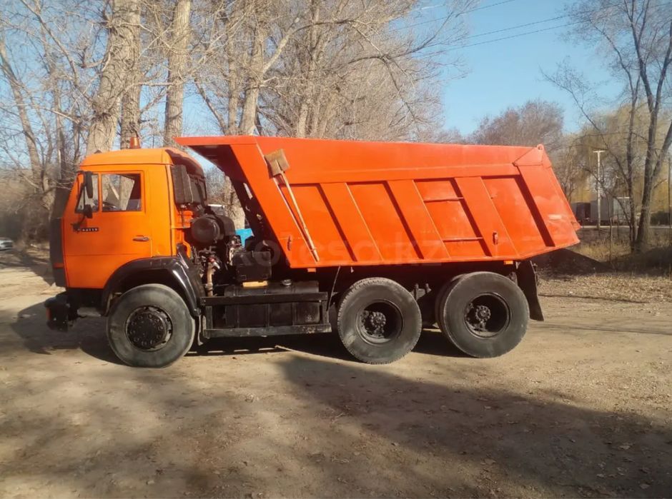 Камаз и Экскаватор погрузчик