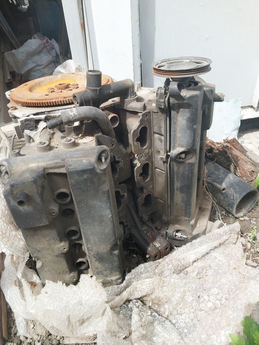 Двигатель б/у Мазда Трибьют