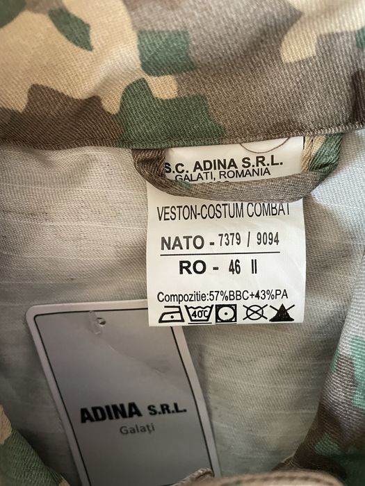 Costum combat nou