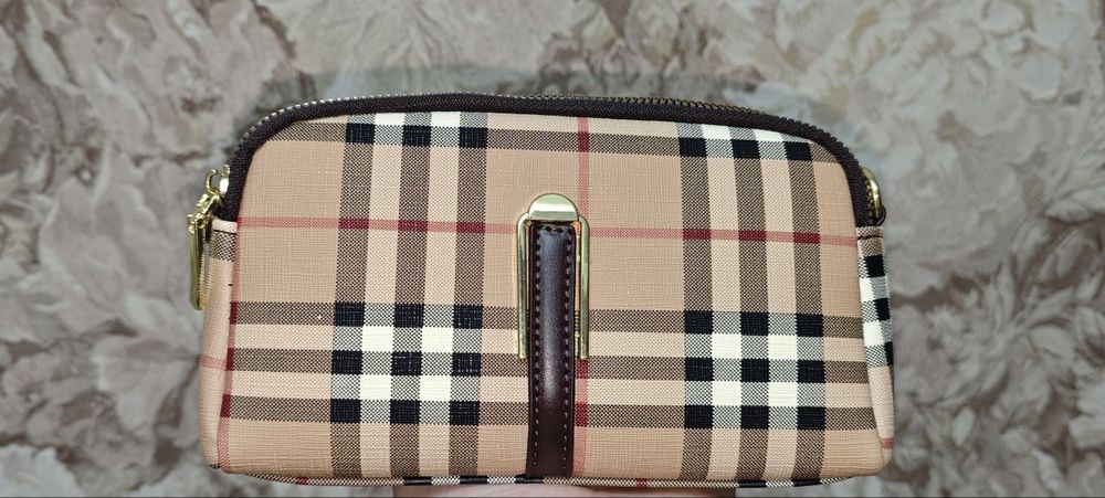 Женские сумки и клатчи