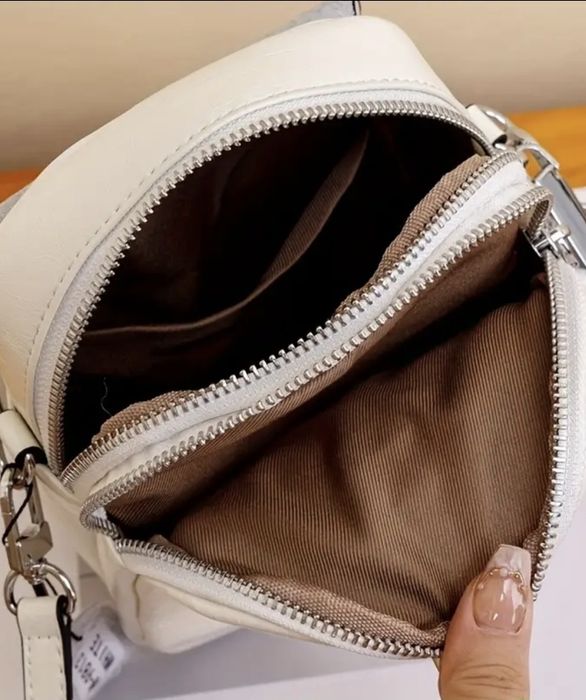 Кожаная сумка на длинном ремне