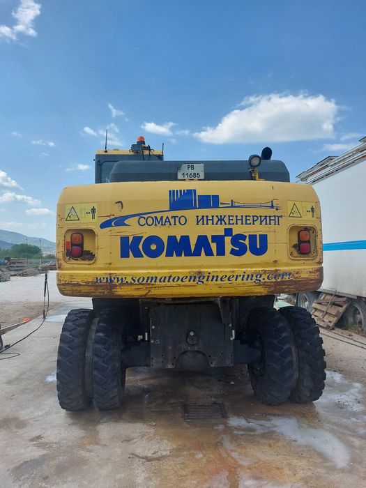 Колесен багер KOMATSU