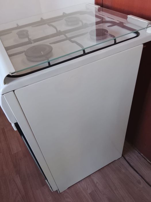 Газовая плиту  DELUXE