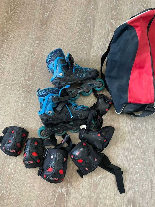 Роликовые коньки