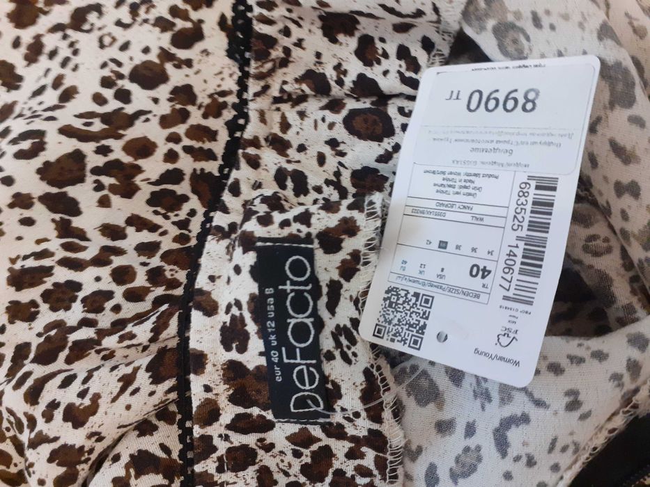 Продам новую, леопардовую юбку-миди