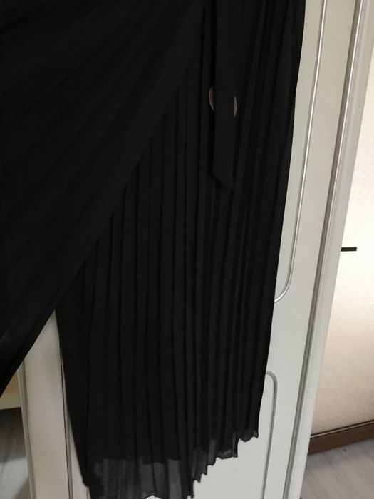 Pantaloni plisati femei