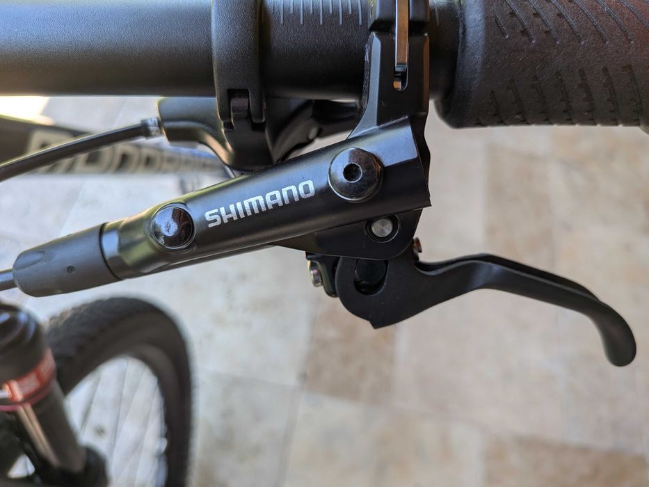 Set frane pentru bicicleta Shimano MT501 cu 2 pistoane hidraulice