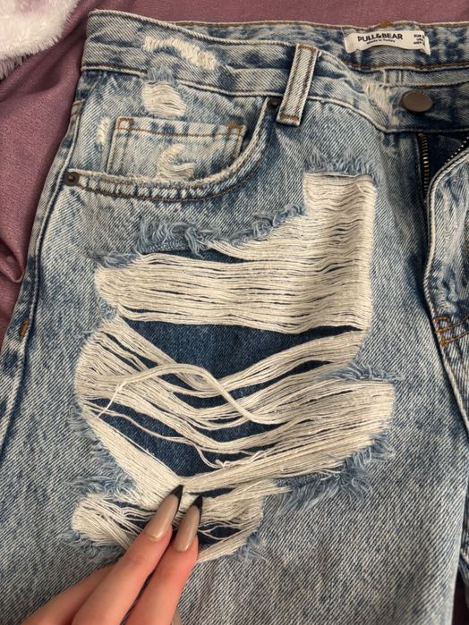 Дамски дънки с накъсан ефект