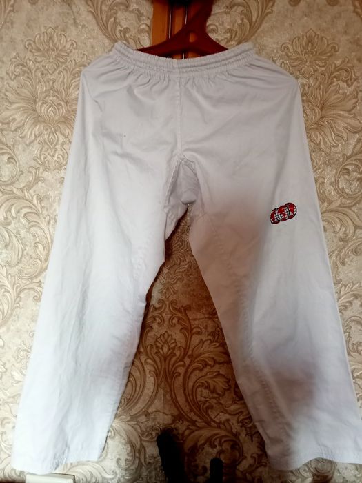 Таэквондо одежда 12 лет,мальчику срочно!!!