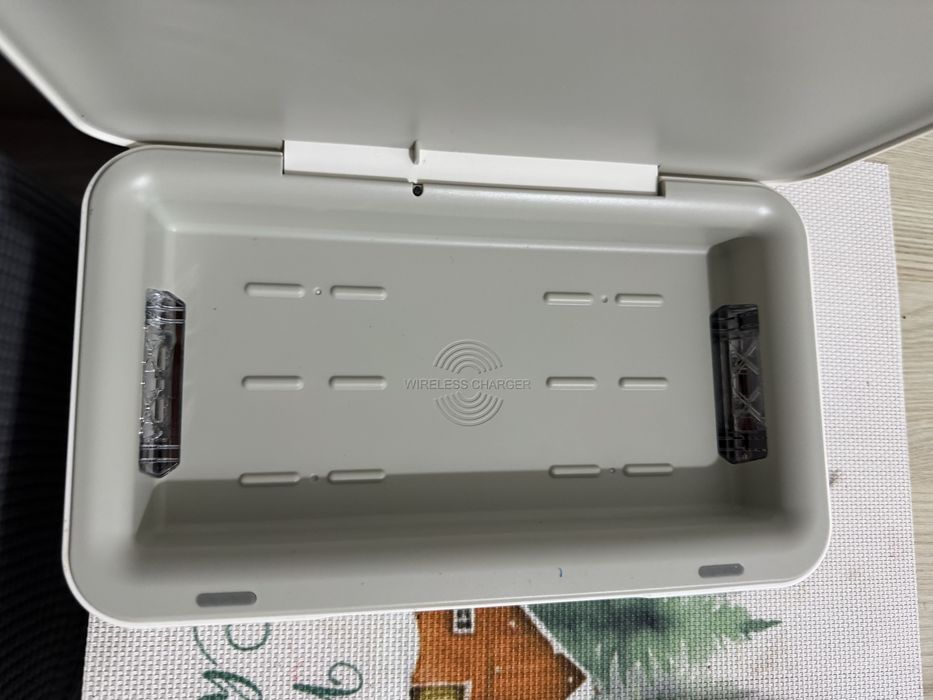 Incarcator wireless cu sterilizator
