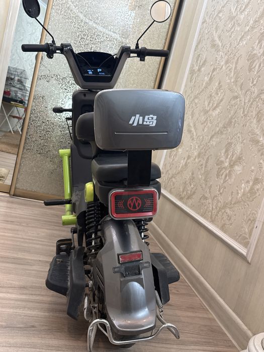 Электробайк черно/зеленого цвета