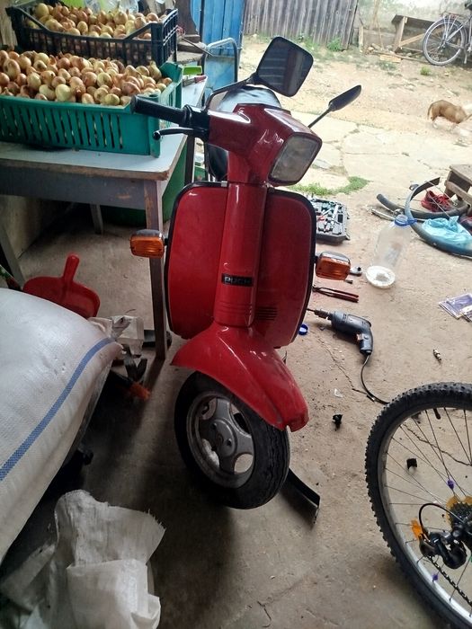 Vând sau schimb scuter suzuky