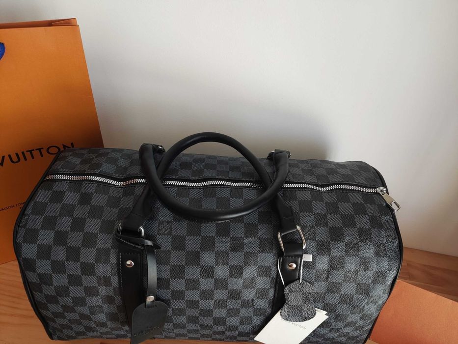 In stoc voiaj, geanta sport piele Louis Vuitton 1109.13
