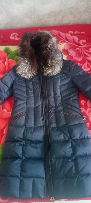 Продаю пуховик женский