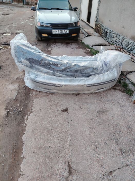 Nexia 1 banferi, oldi va orqa