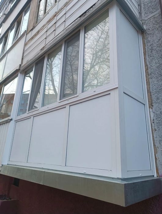 Балконы окна двери