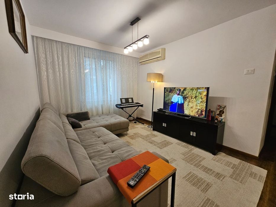 4 camere, decomandat, zonă centrală, etaj 1, 2 balcoane, 2 băi