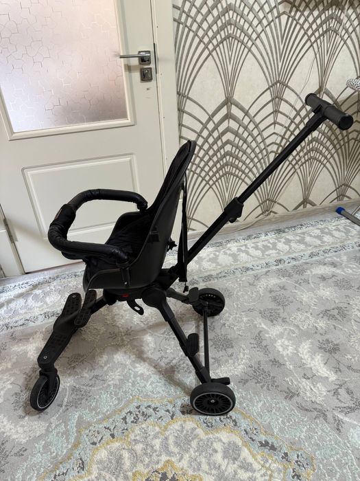 Bolajonlar uchun dron kolyaska