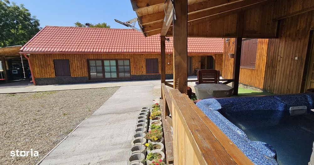Casă vanzare la Zece Hotare cadru montan pitoresc 3.900 mp intravilan