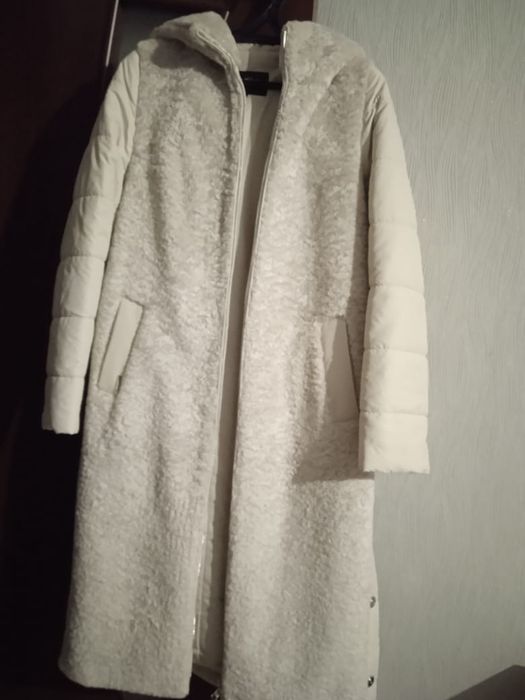 Продам женский пуховик.