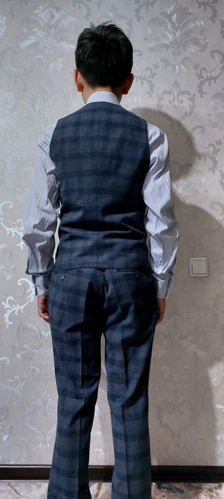 Продам новый костюм