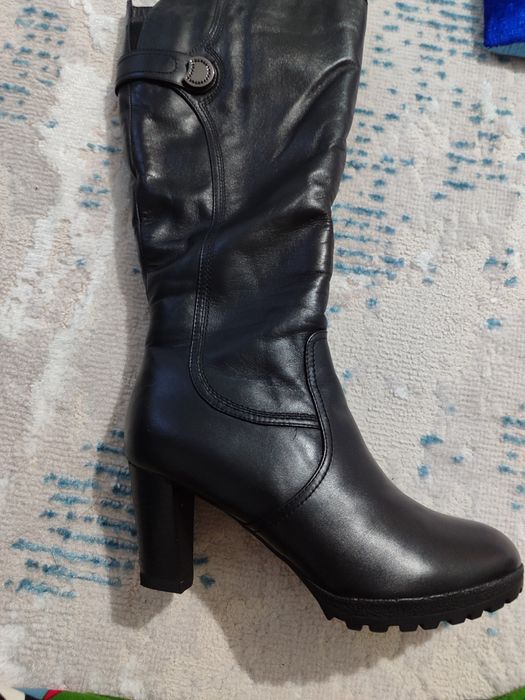 Продам кожанный натуральный сапоги.