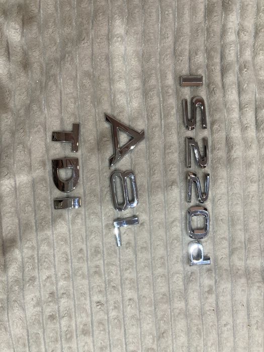 Емблеми Audi, Lexus, TDI