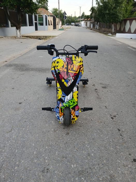 Vând tricicleta electrica drift
