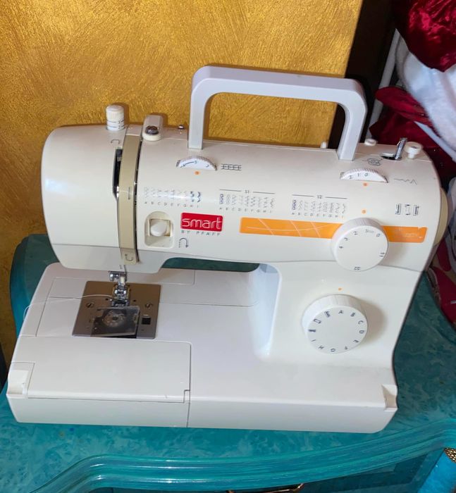 Masina de cusut  smart