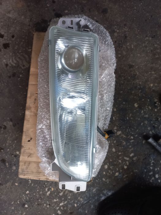 Фара мазда кронос левая