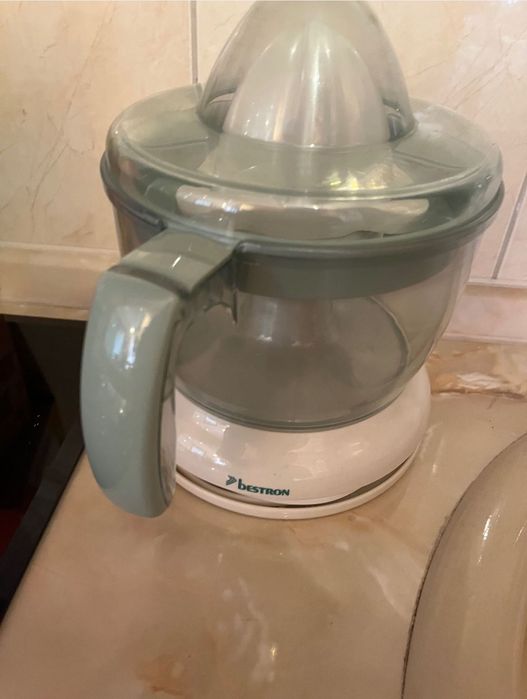 Електрическа цитрус преса