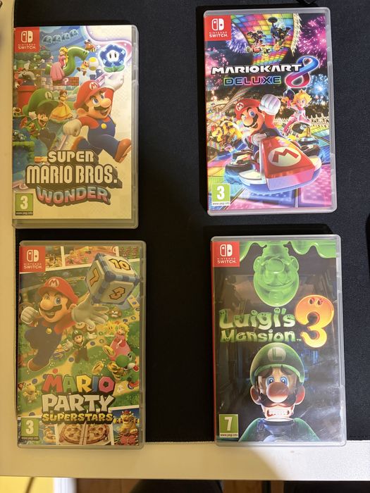 Nintendo swich oled ca nou +3 jocuri Mario si un set joyconuri in plus
