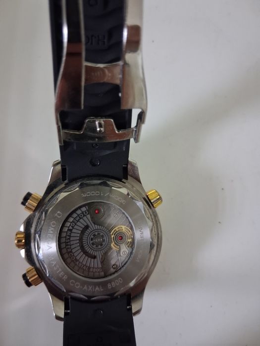 Ceas quart Sector și Omega automatic