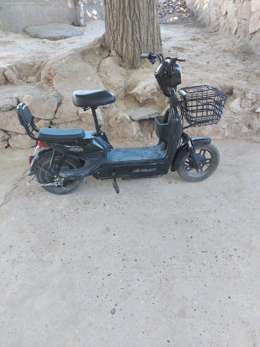 Skuter  kofolati bilan
