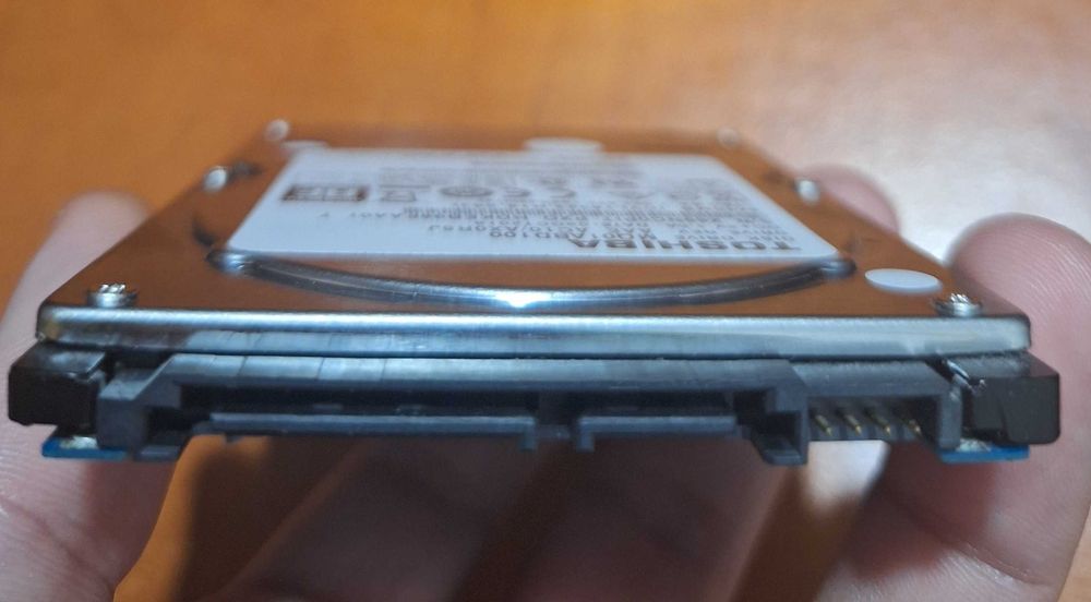 Vand HDD 1TB pentru Laptop 2,5”, S-ATA, health 100%, Toshiba