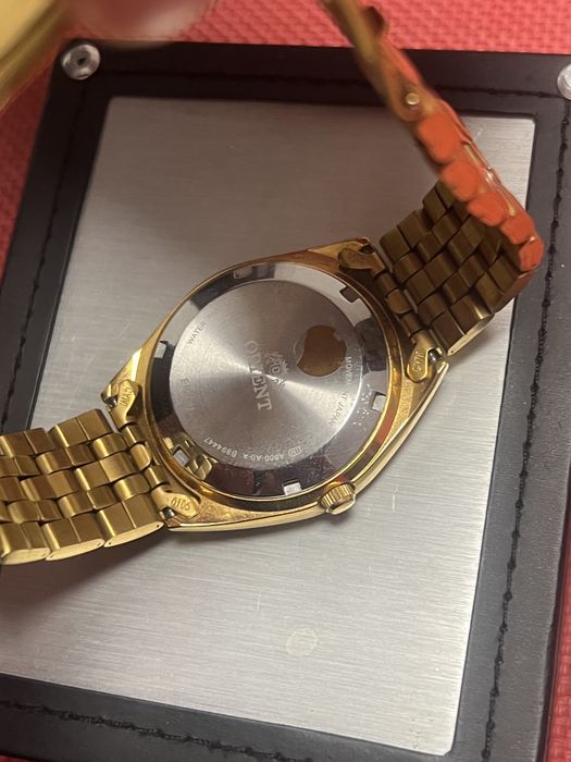 Ceas de mana Orient, suflat in aur