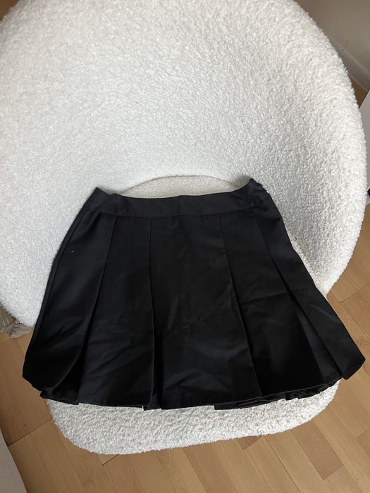 Короткая ,плисированная юбка
