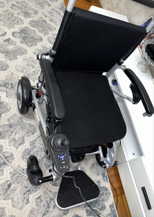 Электронная инвалидная коляска