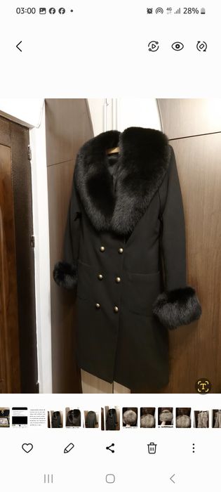 Vând haina din stofa neagra