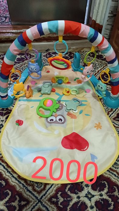 Развивающий коврик и погримугки