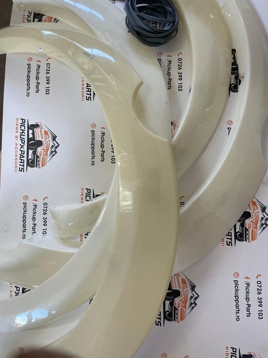 set overfendere (4 buc) mitsubishi l200 2006-2009