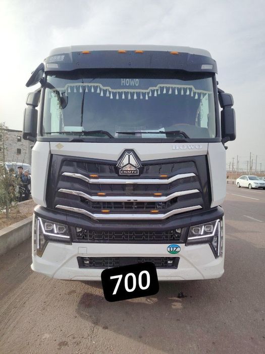 HOWO MAX Газли тягач + Контейнеровоз прицеп Сотилади