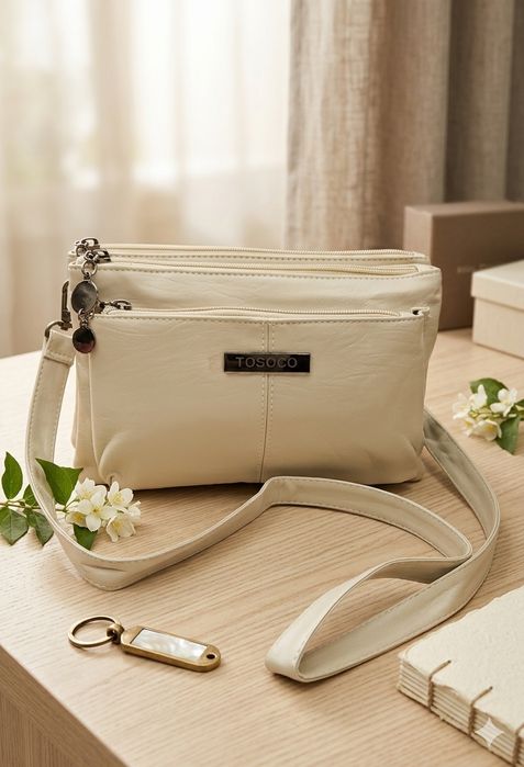 Сумки через плечо женские