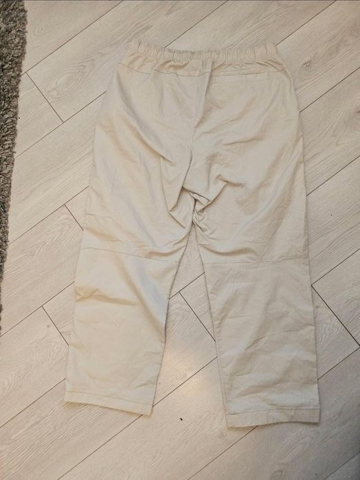Pantaloni Nike culoare bej