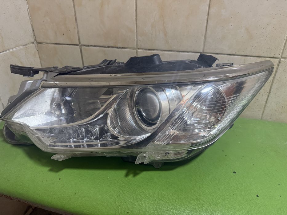 Фара Tayota 55 оригинал левая сторона