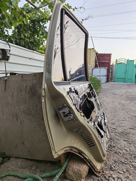 Двери нексия 2009