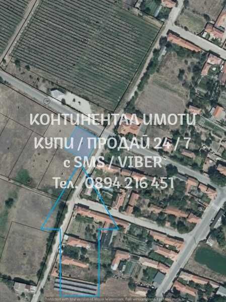 код 62917. Ъглов поземлен имот 650м2 с 25м лице на асфалтов път